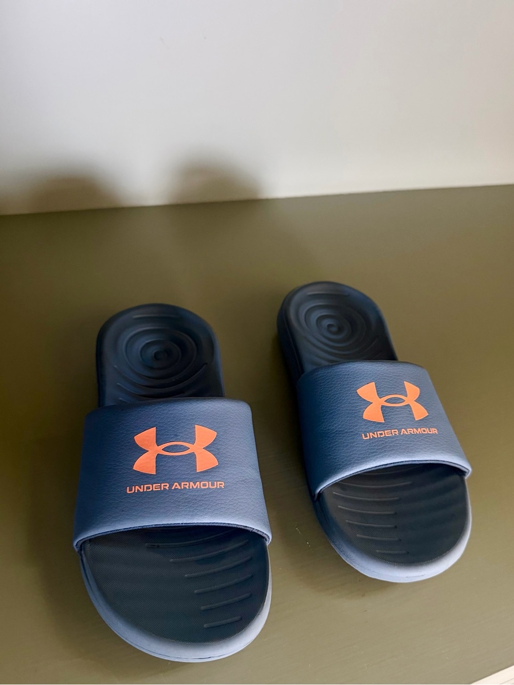 Under Armour Navy Slides with Orange Logo Accents